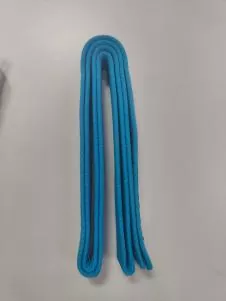 Karate belts in multiple rank colors showing cotton-blend woven texture